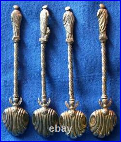 977-Lot of 4 Antique sterling silver souvenir spoon with figurines