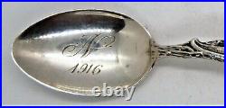 Antique Sterling Silver Souvenir Spoon with Nude Princes in a Canoe going over t
